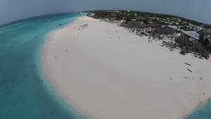 an aerial view of a beach in the ocean at PalumboKendwa in Kendwa