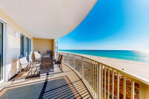 a balcony with a view of the ocean at Ocean Villa in Panama City Beach