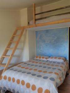 Cama o camas de una habitación en Airesbuenos Hostel y Permacultura