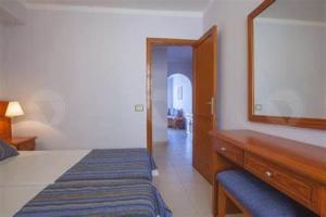 Ένα ή περισσότερα κρεβάτια σε δωμάτιο στο Hotel Malibu Park