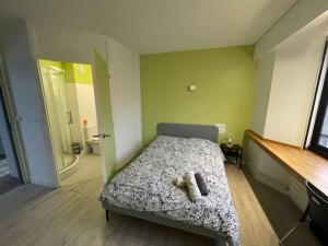 Posteľ alebo postele v izbe v ubytovaní Le Brazza - beau logement 3 chambres avec SDB - 173