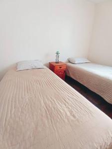 Кровать или кровати в номере Duplex