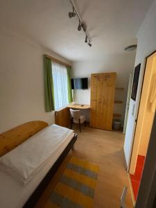 Łóżko lub łóżka w pokoju w obiekcie Waldrestaurant VIDA