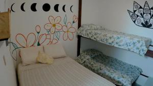 Postel nebo postele na pokoji v ubytování Hostel FreeDive Inn