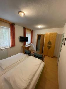 Łóżko lub łóżka w pokoju w obiekcie Waldrestaurant VIDA