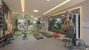 une salle de sport avec des tapis de course dans l'établissement Mana Beach Resort Muro Alto Prime - Porto de Galinhas, à Porto de Galinhas