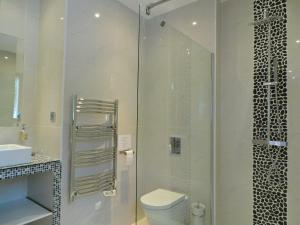 Kúpeľňa v ubytovaní Grande Villa 350 M2, piscine chauffée vue mer et collines, CAVALAIRE sur mer, 10 personnes