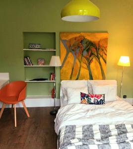Postel nebo postele na pokoji v ubytování Rhotels