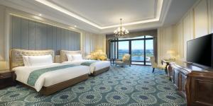 Postel nebo postele na pokoji v ubytování Crowne Plaza Dongying by IHG
