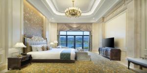 TV a/nebo společenská místnost v ubytování Crowne Plaza Dongying by IHG