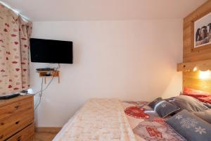 Łóżko lub łóżka w pokoju w obiekcie Amanuq lovely apartment