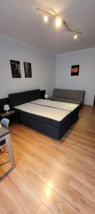 Posteľ alebo postele v izbe v ubytovaní Apartament Skwer Kosciuszki Morze