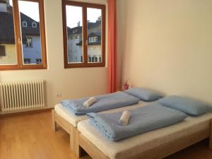 Posteľ alebo postele v izbe v ubytovaní Argentieri Guesthouse