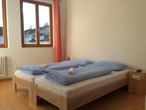 Posteľ alebo postele v izbe v ubytovaní Argentieri Guesthouse
