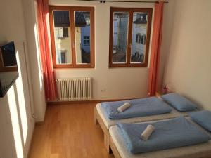 Posteľ alebo postele v izbe v ubytovaní Argentieri Guesthouse