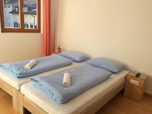 Posteľ alebo postele v izbe v ubytovaní Argentieri Guesthouse