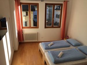 Posteľ alebo postele v izbe v ubytovaní Argentieri Guesthouse