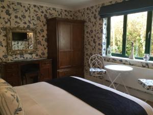 Letto o letti in una camera di Tullybeggs B&B