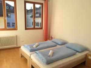 Posteľ alebo postele v izbe v ubytovaní Argentieri Guesthouse