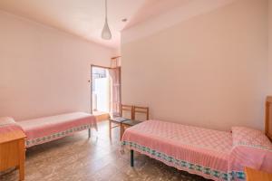 Posteľ alebo postele v izbe v ubytovaní Apartamento las Palmeras 3
