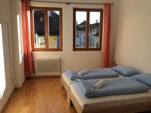 Posteľ alebo postele v izbe v ubytovaní Argentieri Guesthouse