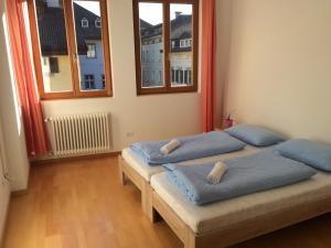 Posteľ alebo postele v izbe v ubytovaní Argentieri Guesthouse