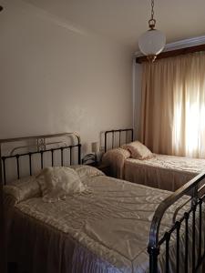 Säng eller sängar i ett rum på Casa Don Julio