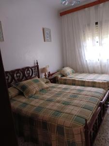 Postel nebo postele na pokoji v ubytování Casa Don Julio