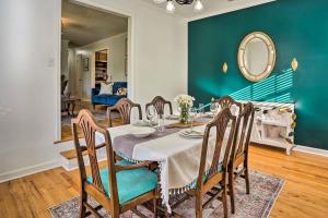 a dining room with a table and chairs at Bright and Cozy Charleston Home Near Downtown! in Charleston