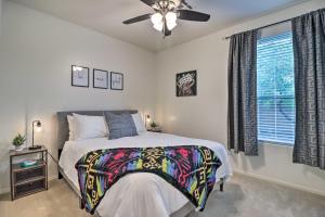 a bedroom with a bed and a ceiling fan at Gold Canyon House with Superstition Mountain Views! in Gold Canyon