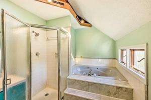 a bathroom with a tub and a shower at Near Ouachita River Home with Deck in Hot Springs in Hot Springs +27 photos