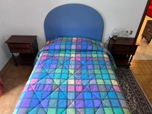 A bed or beds in a room at IL RUSTICO UNO a Bugnara nella Valle del Sagittario