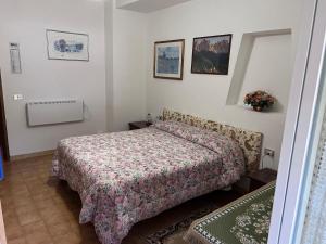 A bed or beds in a room at IL RUSTICO UNO a Bugnara nella Valle del Sagittario