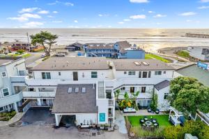 an aerial view of a house and the beach at Pier View Suites - Townhouse B in Cayucos