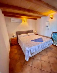 a bedroom with a large bed in a room at Villas2meet Can somni in Ses Salines