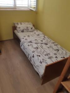 เตียงในห้องที่ Apartman Novi Sad - Apartment Novi Sad