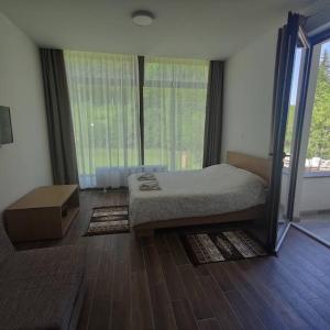 Ένα ή περισσότερα κρεβάτια σε δωμάτιο στο Zlatarska dolina
