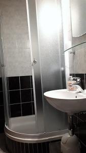 Kúpeľňa v ubytovaní Apartments city center M&M