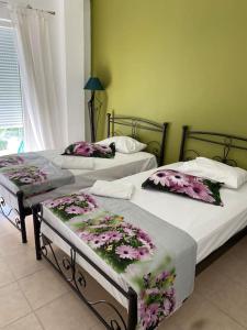 Postel nebo postele na pokoji v ubytování Nefeli Β1 apartment