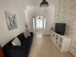 TV a/nebo společenská místnost v ubytování Nefeli Β1 apartment