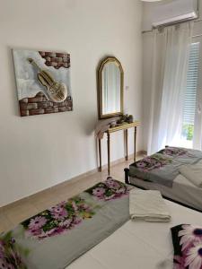 Postel nebo postele na pokoji v ubytování Nefeli Β1 apartment