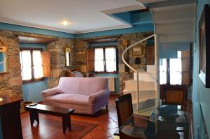 Гостиная зона в apartamentos y habitaciones Quinta La Espadaña apartamentos y habitaciones Quinta la Espadaña