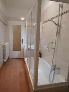 Ванная комната в AppartamentoMonika con parcheggio privato - Volano