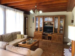 Et tv og/eller underholdning på Atlantida Deluxe penthouse by Apartamentos Estrella del Norte