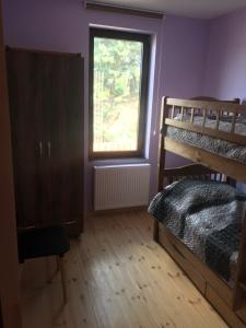 Letto o letti in una camera di House Near Forest