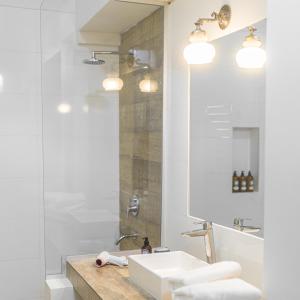 a bathroom with a sink and a shower at Bella Tilcara Boutique Hotel in Tilcara +21 photos