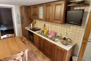 Kuchyň nebo kuchyňský kout v ubytování Casa in splendida riserva naturale