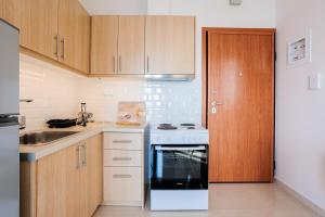 Kuchyňa alebo kuchynka v ubytovaní Georgia seaview apartments Α2