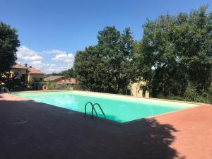 Bazén v ubytování Cuore della Toscana nebo v jeho okolí + 7 fotografií