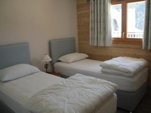 Ein Bett oder Betten in einem Zimmer der Unterkunft Appartement Châtel, 4 pièces, 6 personnes - FR-1-200-298
